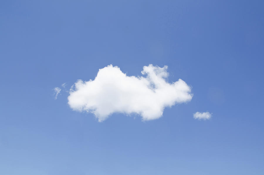 USA, New York, White cumulus cloud in clear blue sky Photograph by Chris Hackett