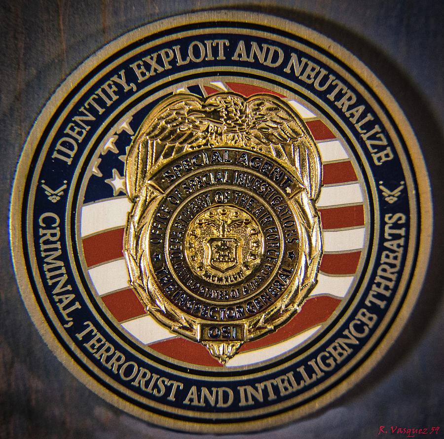 USAF OSI Challenge Coin Photograph by Rene Vasquez