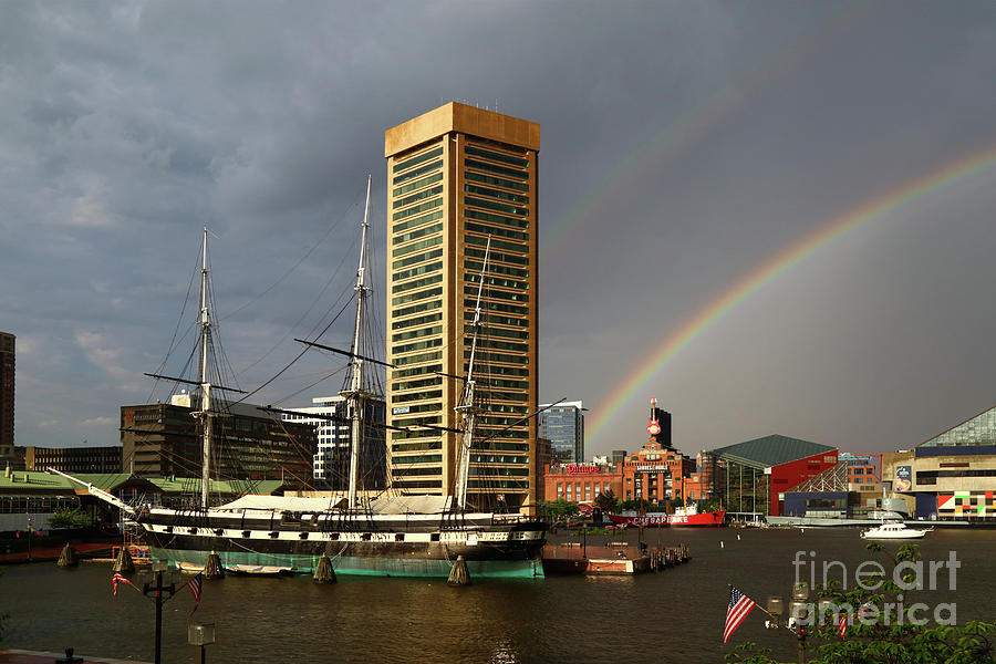 USS Constellation Rainbow and Inner Harbor Baltimore Photograph by James Brunker