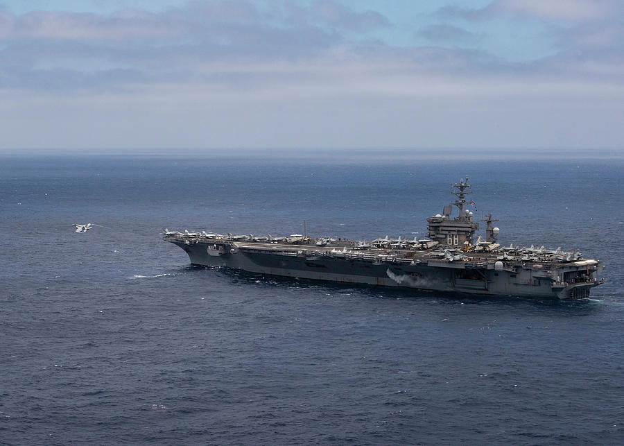 USS Nimitz CVN 68 conducts flight operations during a composite training unit exercise. Painting by MotionAge Designs