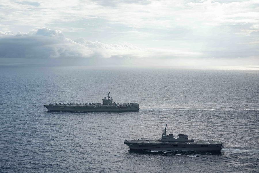 USS Ronald Reagan  and JS Ise are underway in the Philippine Sea.  Painting by MotionAge Designs