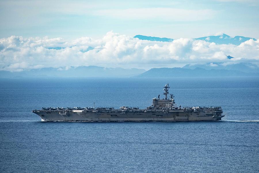 USS Ronald Reagan  transits the Surigao Strait. Painting by MotionAge Designs
