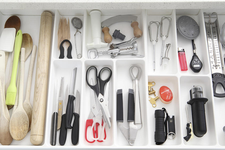 Utensils in kitchen drawer Photograph by Image Source