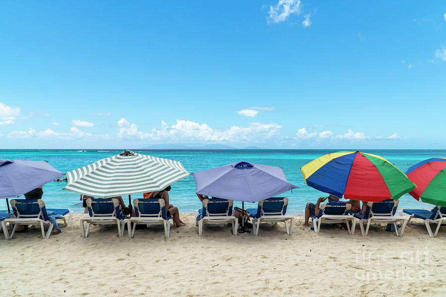 Vacationers enjoy Ffryes Beach on the west side of Antigua, Anti Photograph by William Kuta