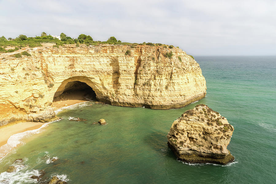 Vale Covo in Gold and Turquoise - Seacave and Seastack at Carvoeiro Algarve Portugal Photograph by Georgia Mizuleva