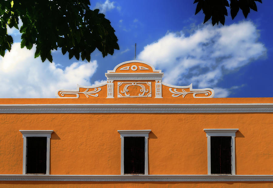 Valladolid Colors - skyline of a bright yellowish building facade in downtown Valladolid Photograph by Peter Herman