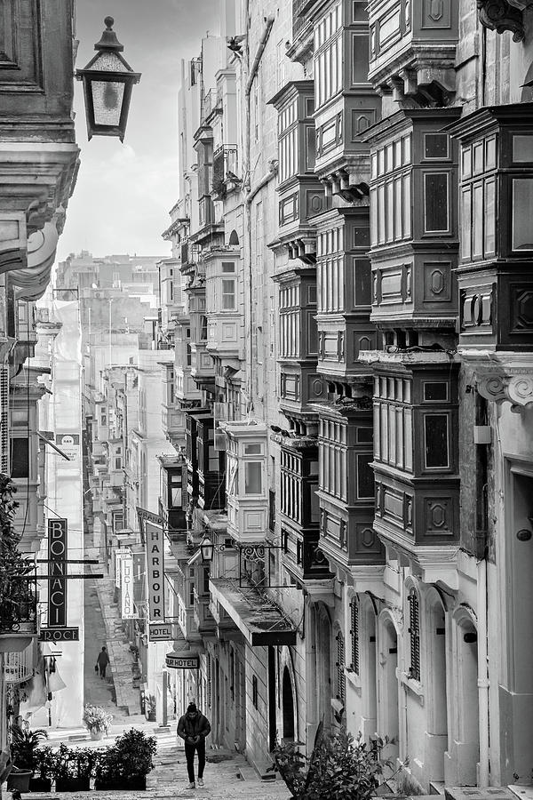 Black And White Photograph - Valletta Street lined with Window Boxes, Malta - Black and White by Barry O Carroll