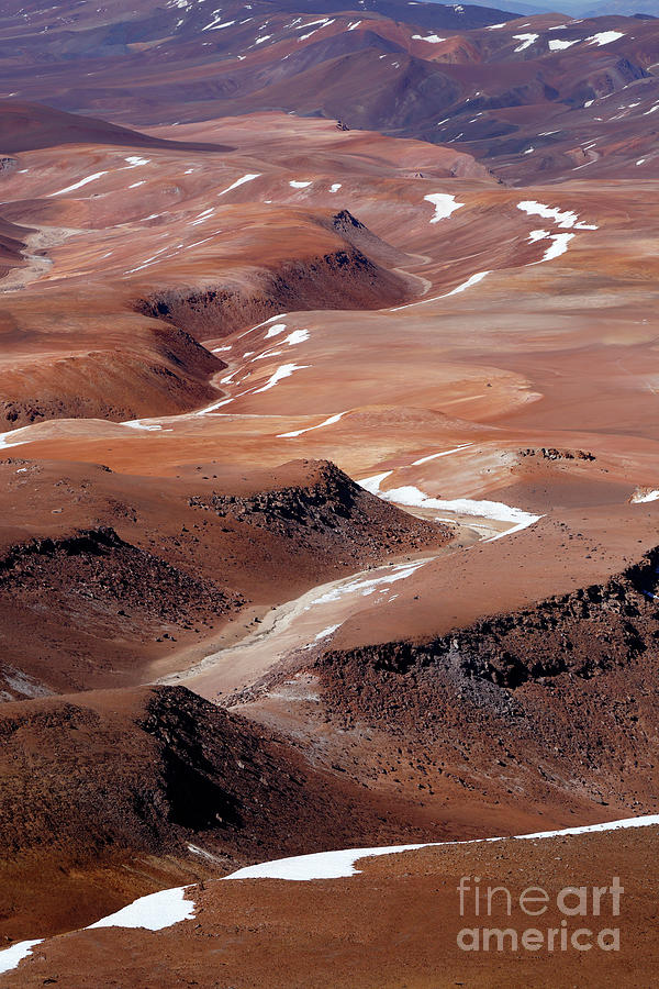 Valleys and ridges in the Puna de Atacama deserts Chile Photograph by James Brunker