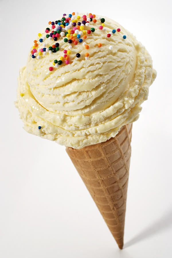 Vanilla ice cream cone with sprinkles Photograph by Ac_bnphotos