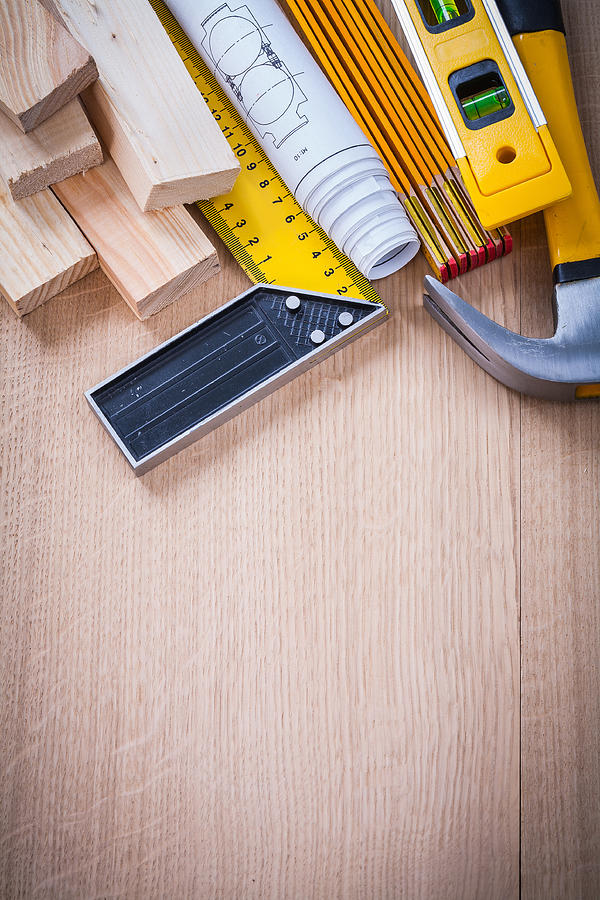 Variation of working building tools on wooden board vertical ver Photograph by Mihalec