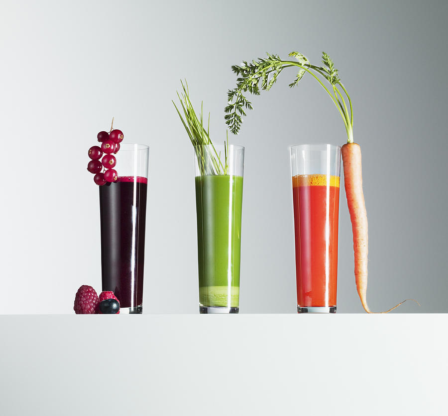 Variety of fruit and vegetable juices Photograph by Martin Barraud