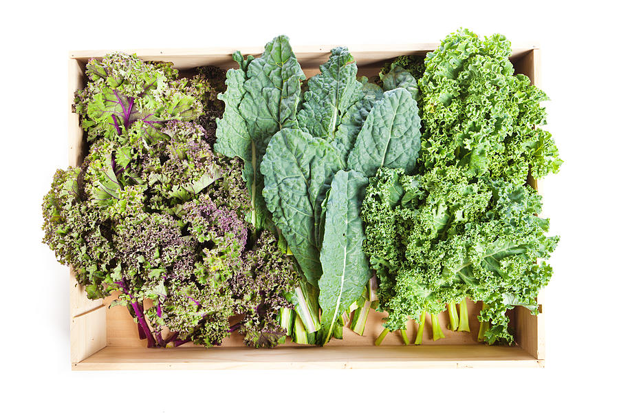 Variety of Green Kale in a Crate on White Background Photograph by YinYang