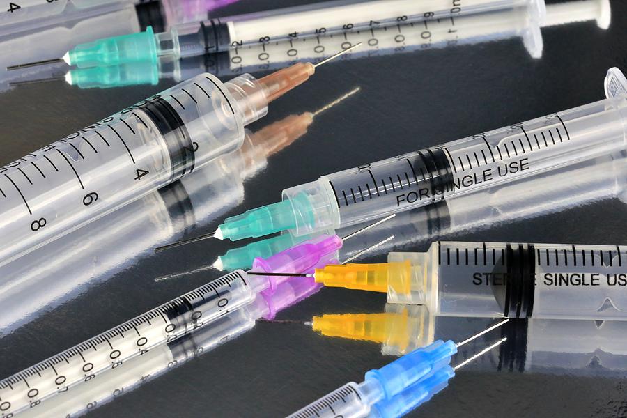 Variety of medical Syringes with Hypodermic needles Photograph by Douglas Sacha