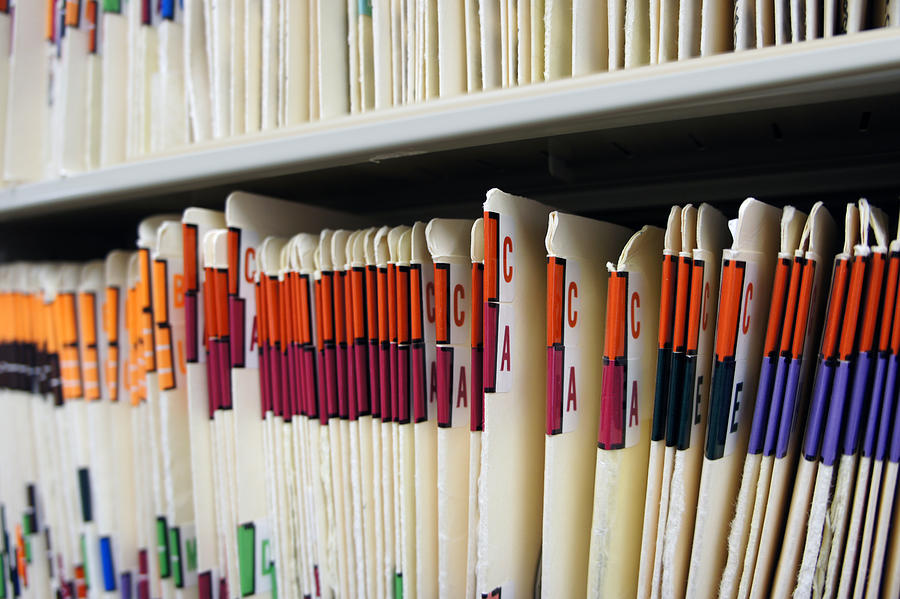 Various alphabetized medical records Photograph by Fotofrog