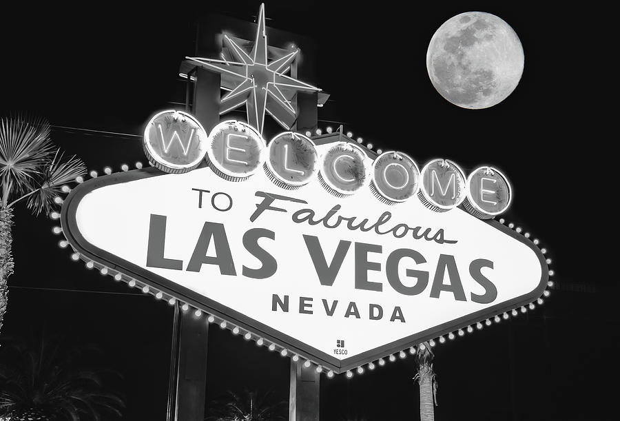 Las Vegas Photograph - Vegas Sign Under A Full Moon - Black and White by Gregory Ballos