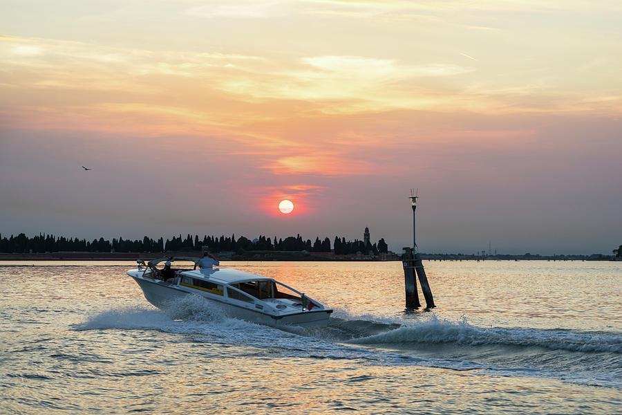 Venetian Water Taxi - Speedboating on the Venice Lagoon at Sunset  Photograph by Georgia Mizuleva