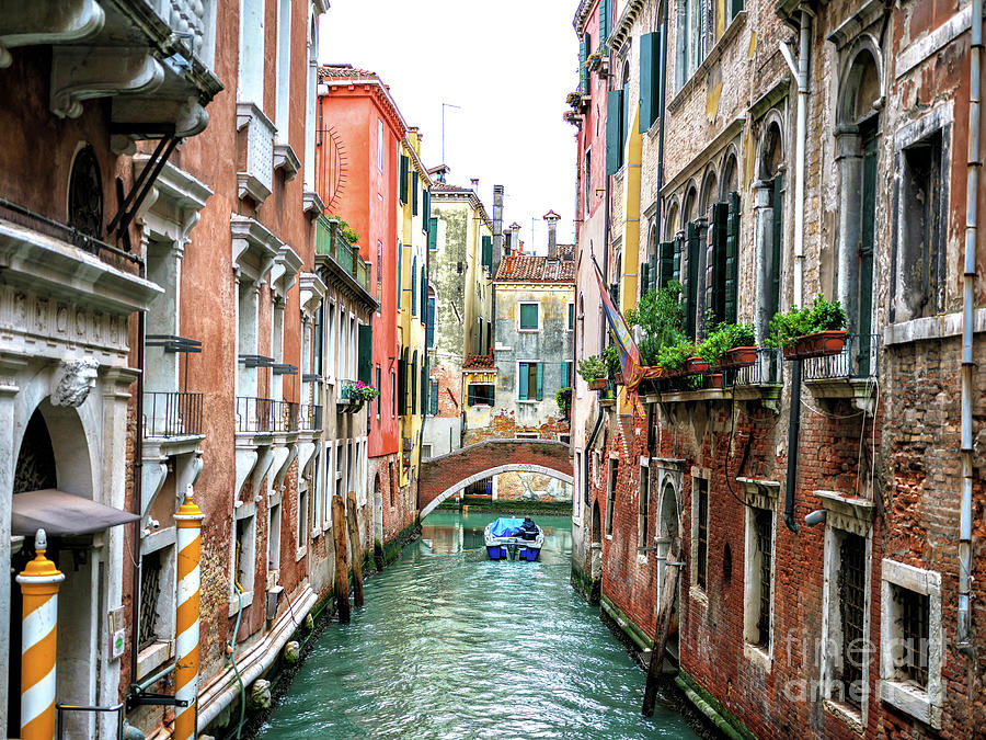 Venezia Boat on the Canal Photograph by John Rizzuto