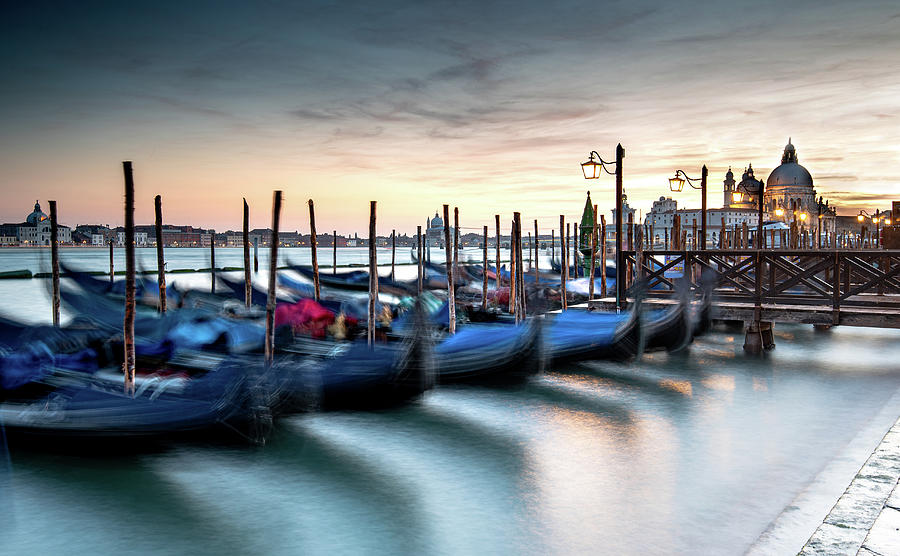 Venice Gondolas moored at the San Marco square. Photograph by Michalakis Ppalis