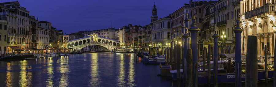 Venice Rialto Bridge Grand Canal gondolas illuminated landmark panorama Italy Photograph by fotoVoyager