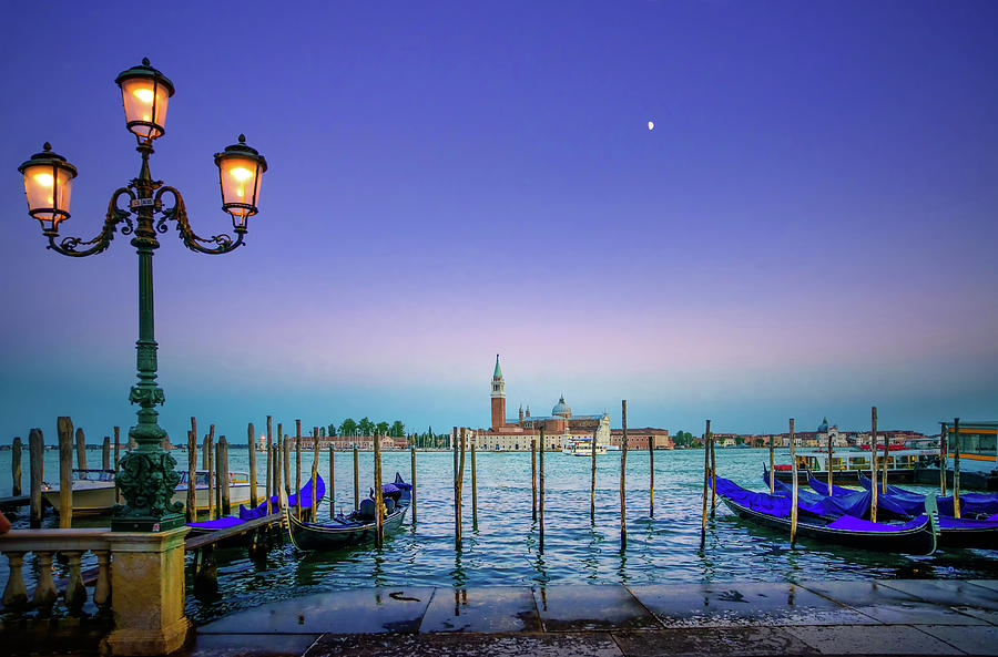 Venice, street lamp and gondolas or gondole on sunset and church Photograph by Stefano Orazzini