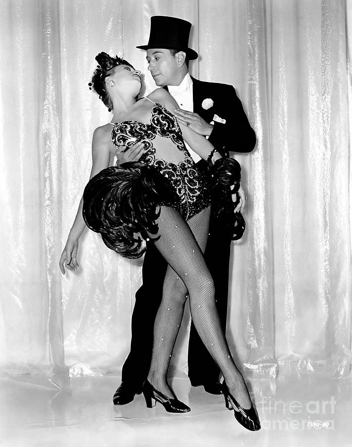 Vera Zorina and George Raft - Follow the Boys - 1943 Photograph by Sad Hill - Bizarre Los Angeles Archive