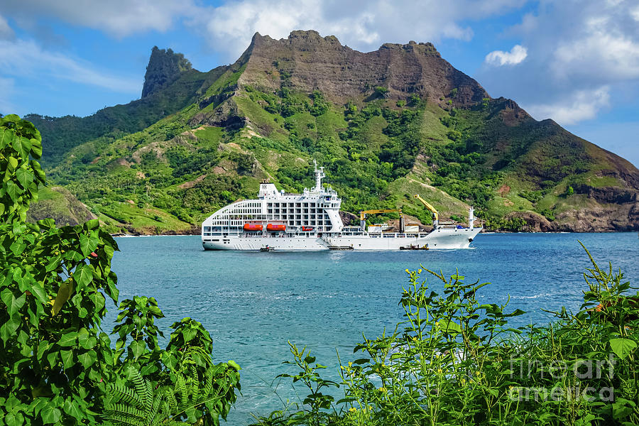 Vessel anchored in Puamau Bay, Hiva Oa, Marquesas Islands Photograph by Lyl Dil Creations