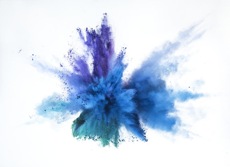 Vibrant blue and purple powder explosion Photograph by Jonathan Knowles