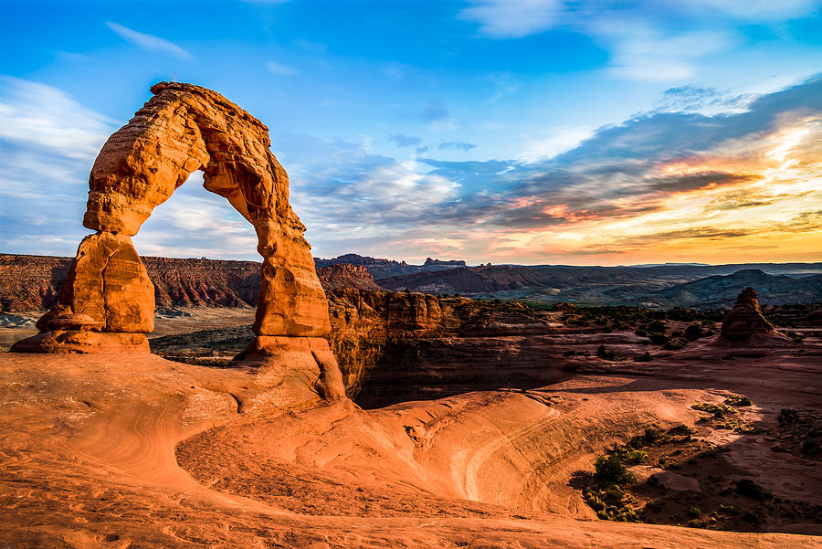 Vibrant Sunset over the Delicate Arch, Arches National Park Photograph by Greg Jaggears