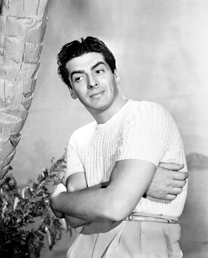VICTOR MATURE in SONG OF THE ISLANDS -1942-, directed by WALTER LANG. Photograph by Album