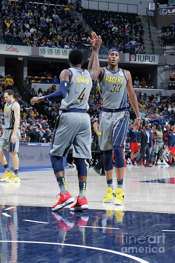 Victor Oladipo and Myles Turner Photograph by Ron Hoskins