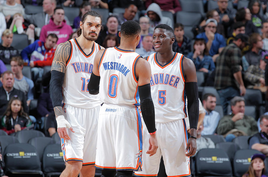 Victor Oladipo, Russell Westbrook, and Steven Adams Photograph by Rocky Widner