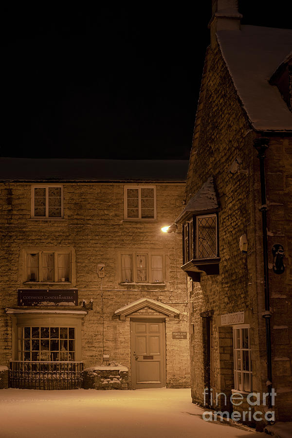 Victoria Street Bourton on the Water at Night in the Snow Photograph by Tim Gainey