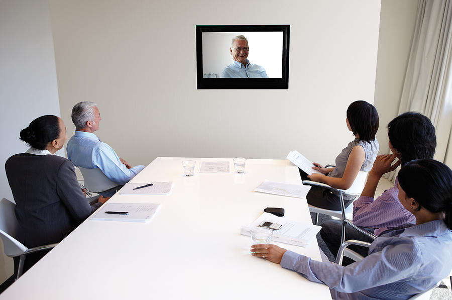 Video conference meeting Photograph by Alistair Berg