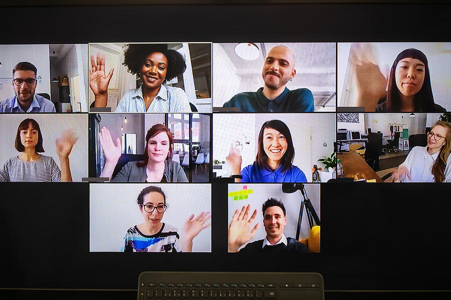 Video meeting on desktop screen Photograph by Luis Alvarez