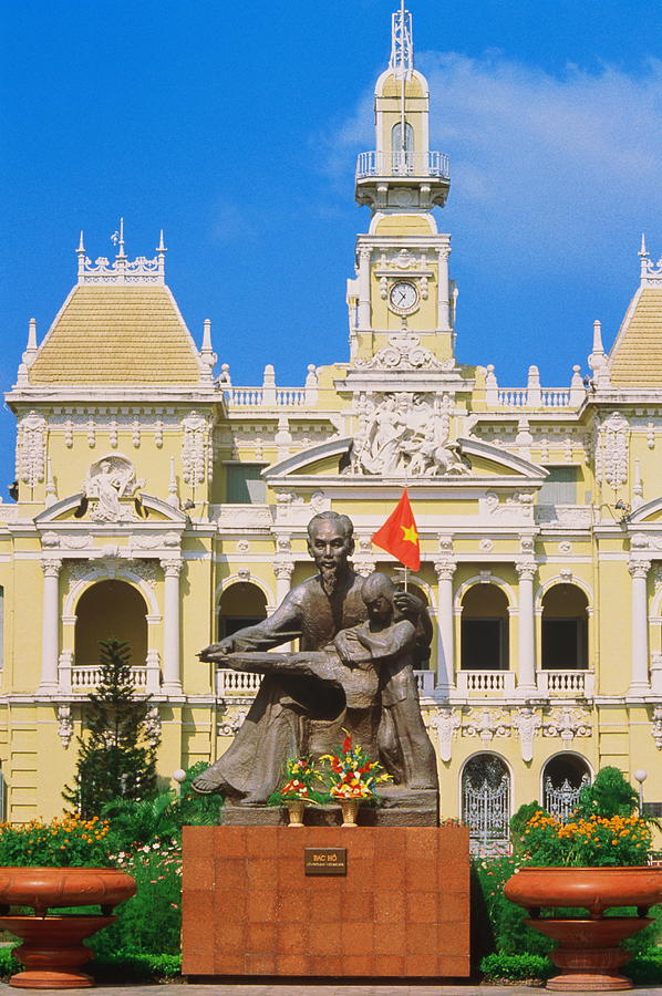 Vietnam, Ho Chi Minh City, statue of Bac Ho in front of city hall Photograph by John Elk III