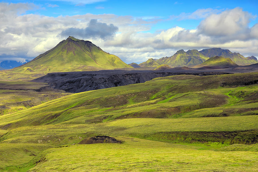 View across grassy and mossy green open land to mountain Hattafell Photograph by Rainer Grosskopf