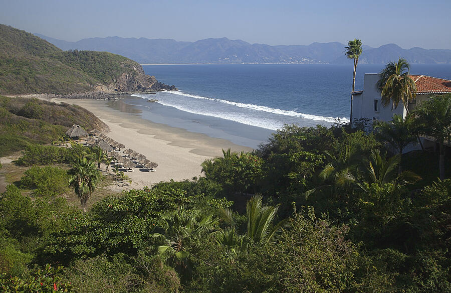 View from above of palapas on a beach at Tenacatita Bay, Costalegre, Jalisco, Mexico Photograph by Timothy Hearsum
