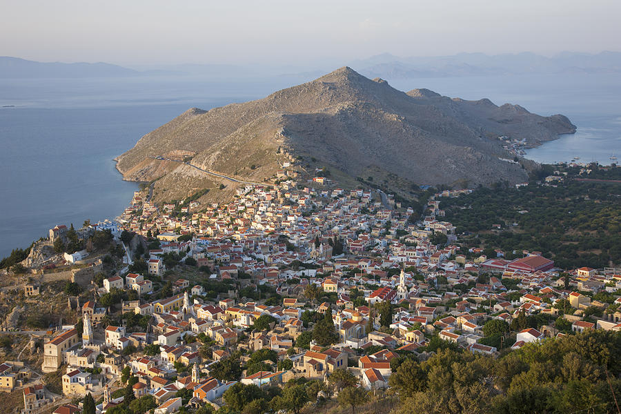 View from hillside at sunset, Horio, Symi, Greece Photograph by David C Tomlinson