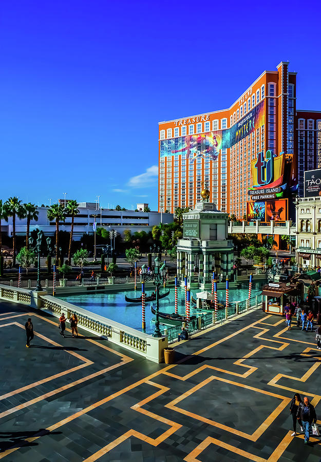 View From The Venetian to Treasure Island Photograph by Rodney Lee Williams