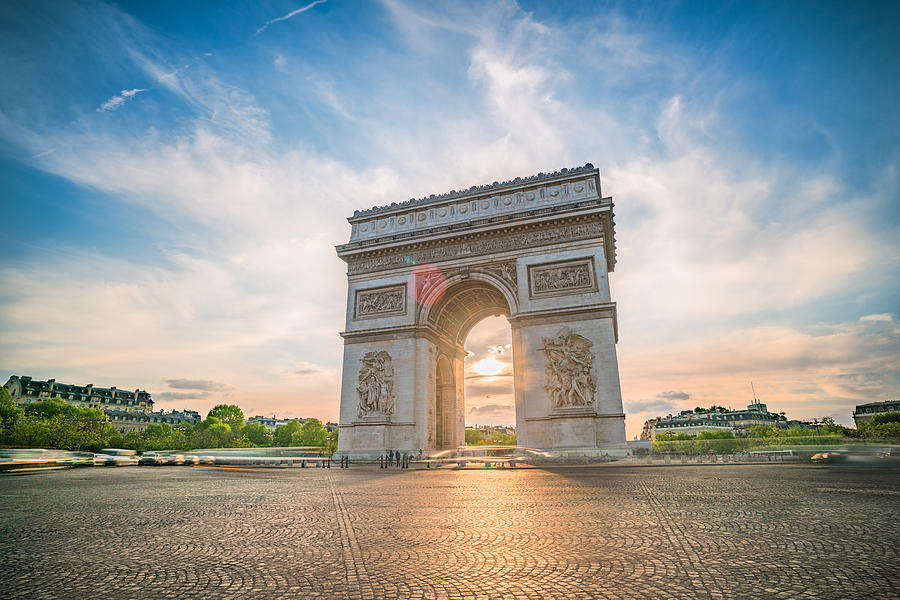 View of arc de Triomphe in Paris at sunset. Photograph by Ian.CuiYi