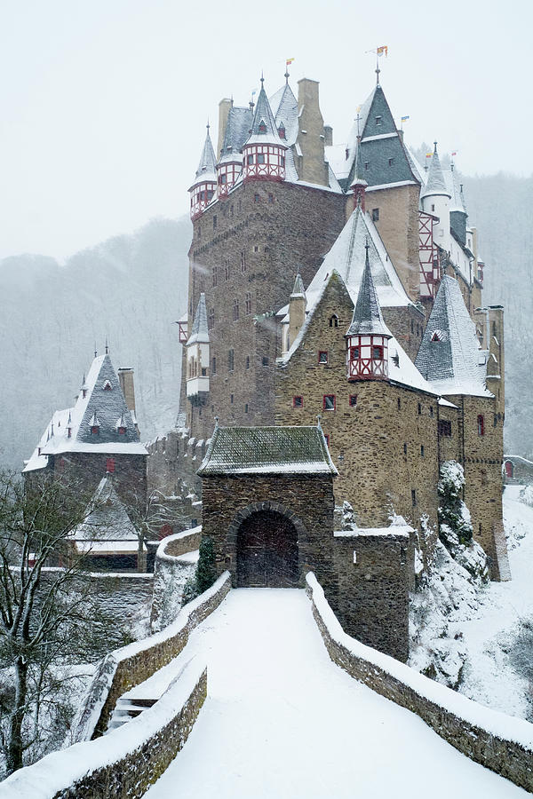 View of Burg Eltz castle in winter snow in Germany Photograph by Iain ...