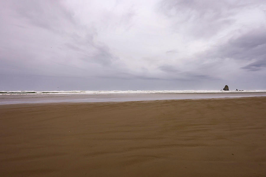View Of Canon Beach With A Storm Coming In Photograph