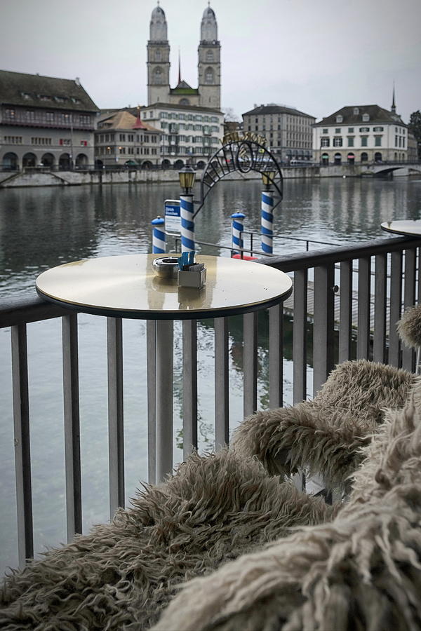View of Grossmunster church from a waterfront cafe ,Zurich. Photograph by Emreturanphoto