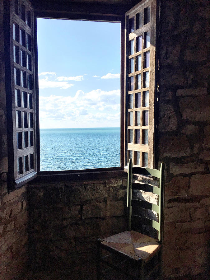 View of idyllic sea through window Photograph by Ane Aleman Lamothe / FOAP