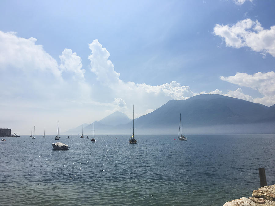 View of Lake Garda with sailboats, Brenzone sul Garda Photograph by Larissa Veronesi