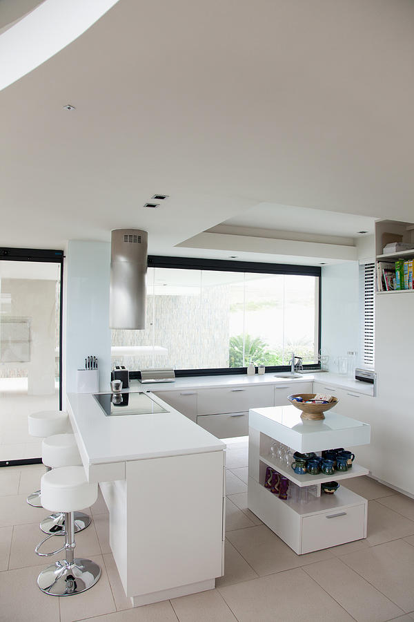 View of modern kitchen Photograph by Martin Barraud