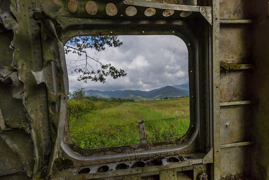 View of mountains in Bario from the Bario plane wreckage, which is located by a local home stay called Nancy Hariss Homestay. Photograph by Shaifulzamri