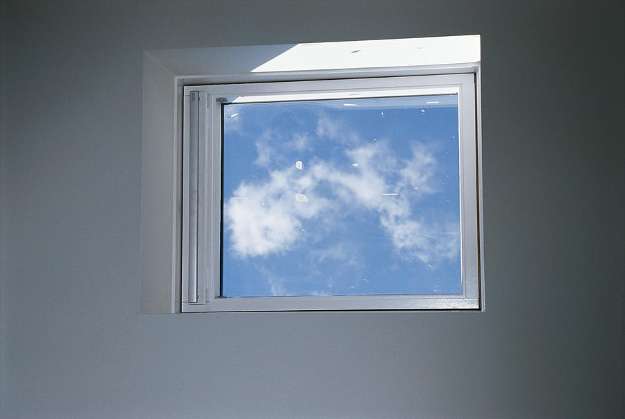 View of sky through glass window Photograph by David De Lossy