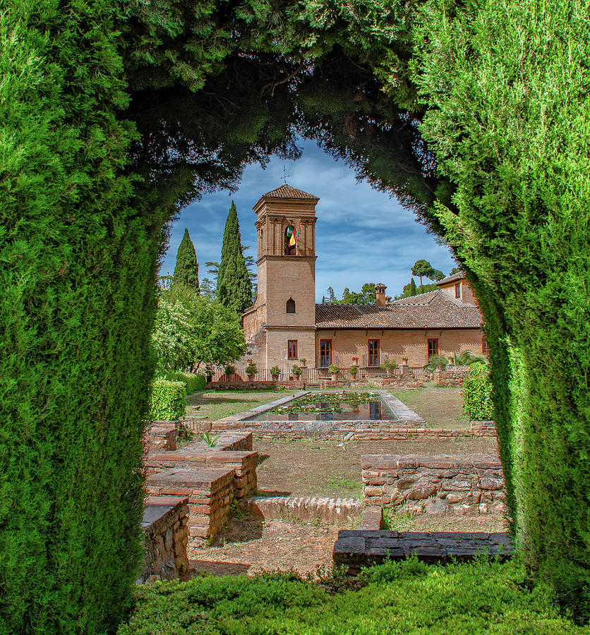 View of the Alhambra Bell Tower From the Gardens Photograph by Marcy Wielfaert