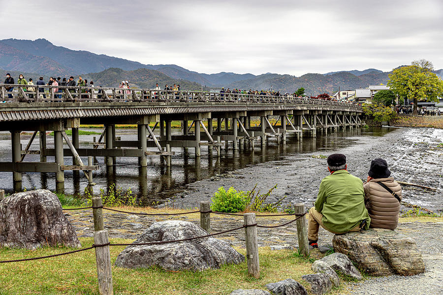 View of the busy Togetsukyo Bridge in Kyoto Photograph by Gualtiero Boffi